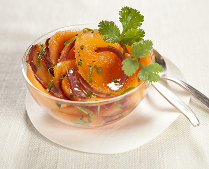 Salade de melon au citron vert et magret fumé