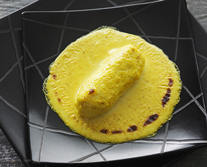 Quenelles de brochet gratinées au curry