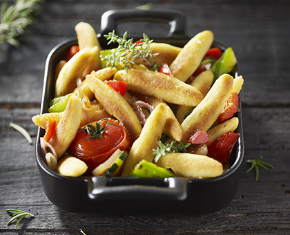 Cassolette de mini quenelles  aux légumes