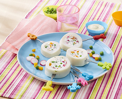 Sucettes de calmars farcis aux radis, petits pois & fromage frais