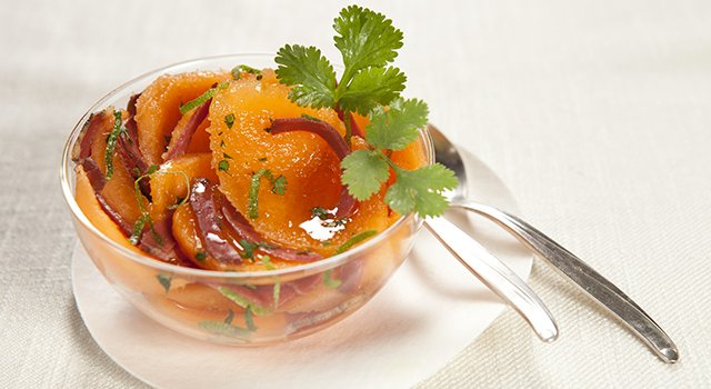 Salade de melon au citron vert et magret fumé